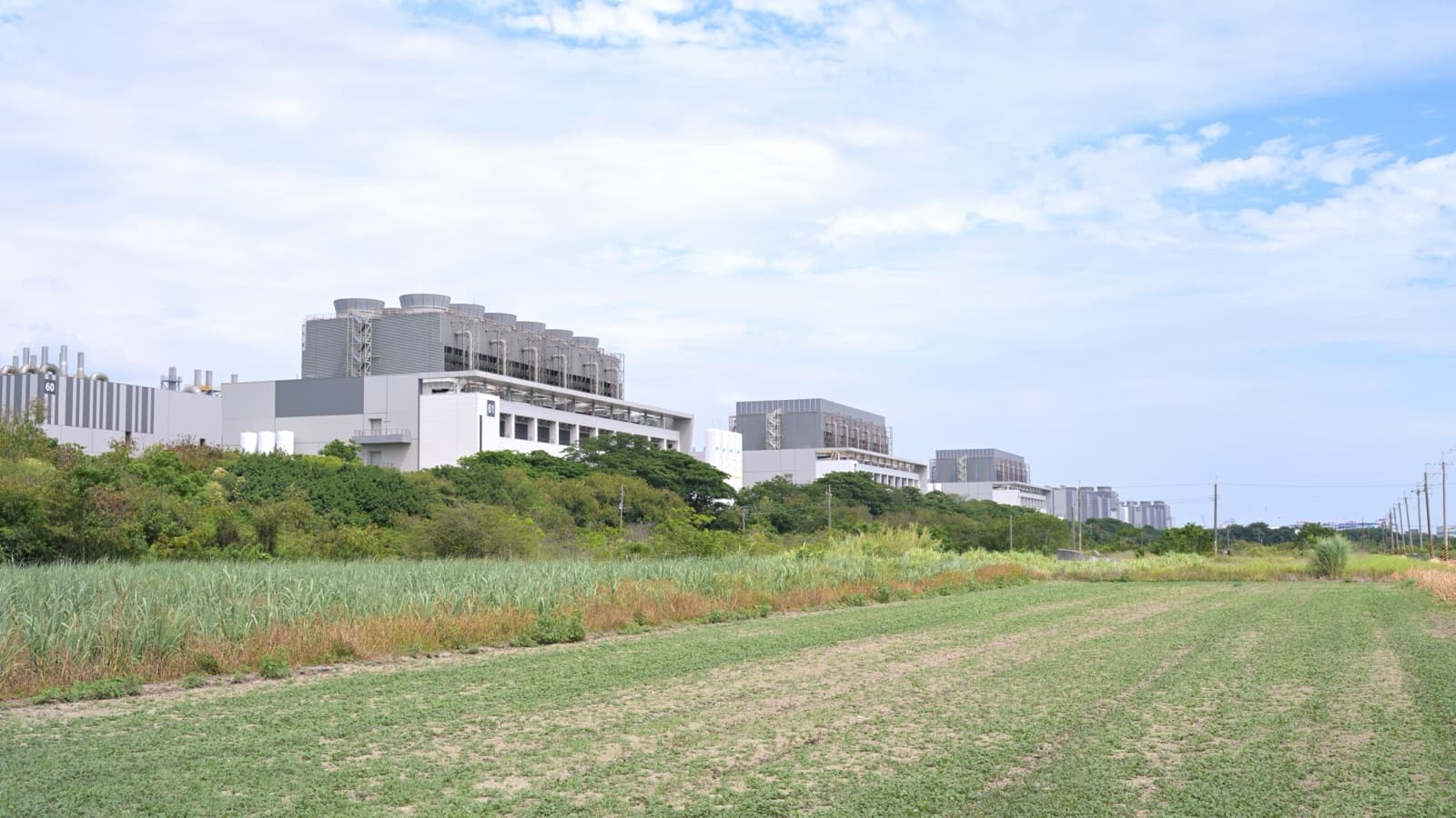 TSMC Fab 18 semiconductor plant beside green fields in southern Taiwan