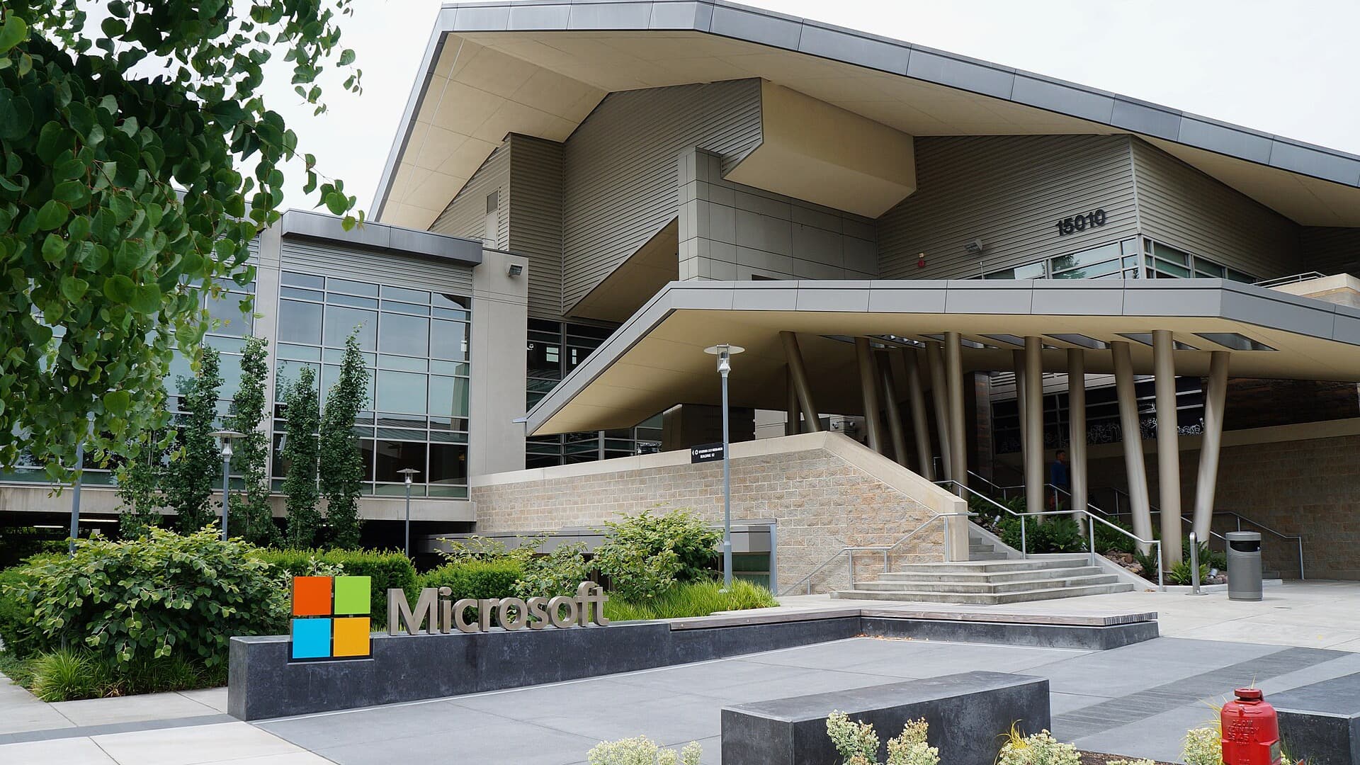 Microsoft Building 92 on the Redmond campus, with the Microsoft sign in front of the entrance.
