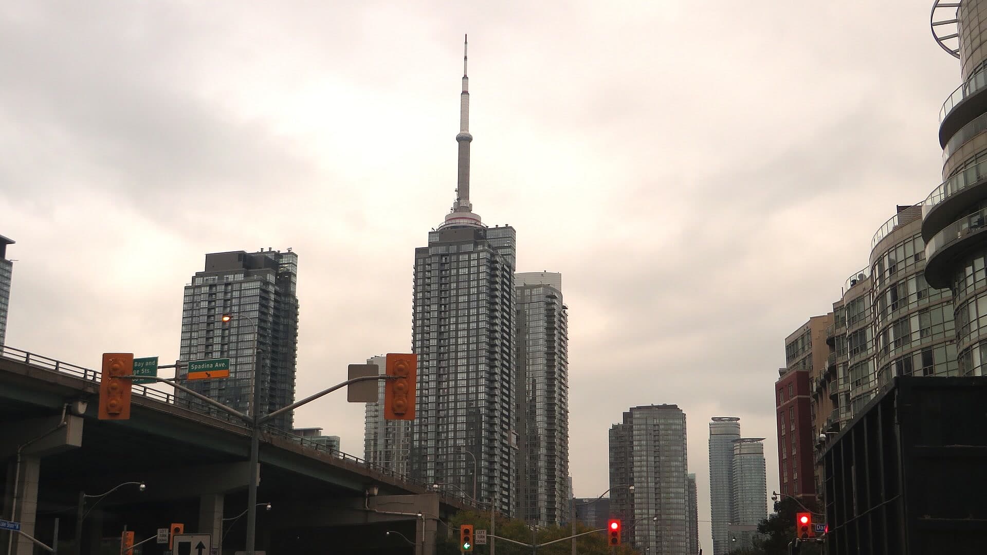 High-rise buildings and traffic lights along a downtown Toronto street