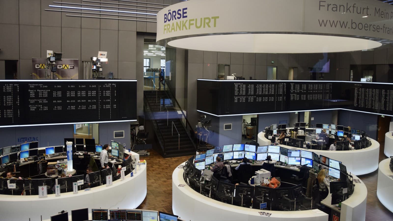 Archival 2015 view of the Frankfurt Stock Exchange trading floor and quotation boards.
