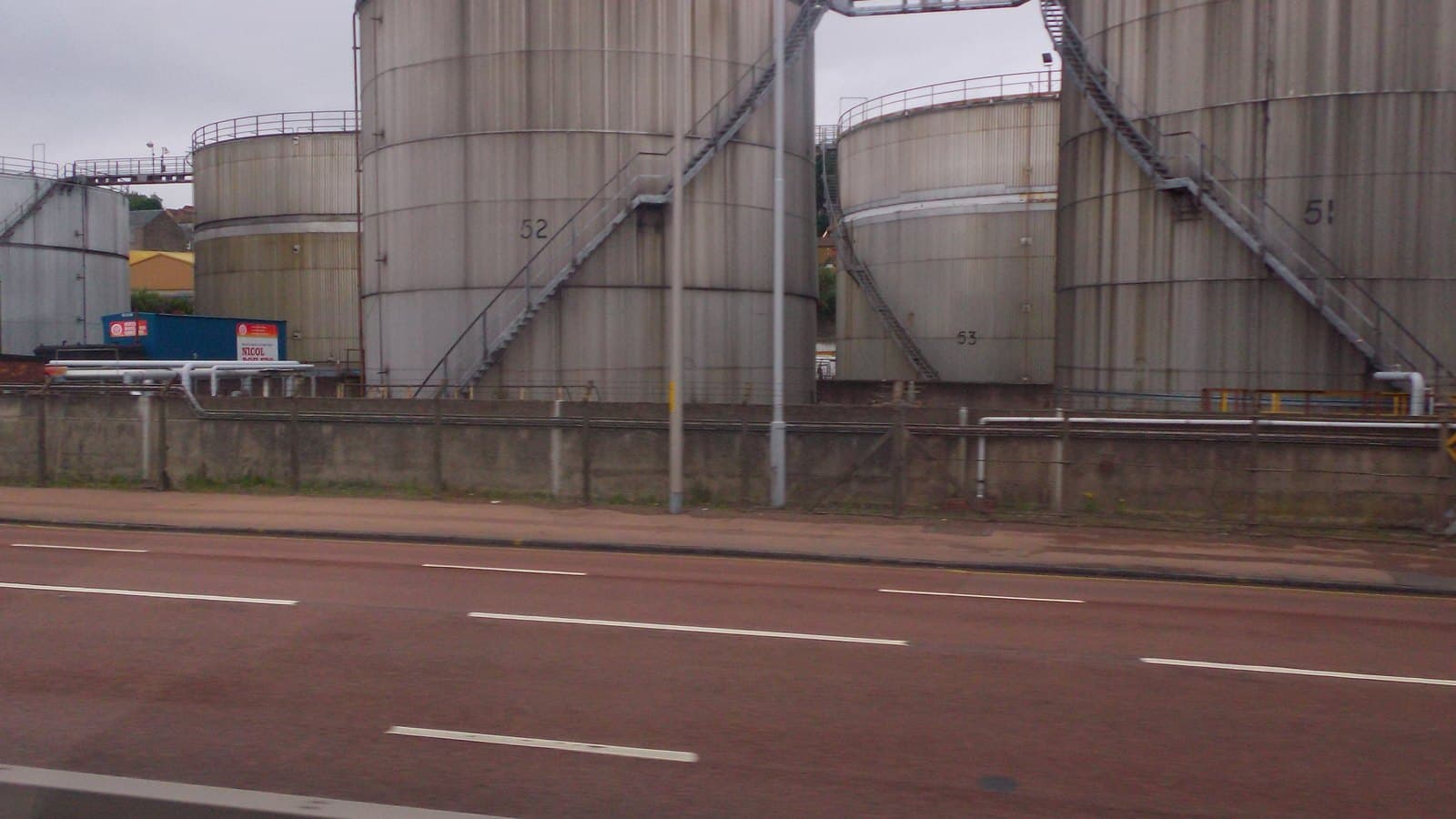 Oil storage tanks at Camperdown Refinery in Dundee, Scotland; archival petroleum-inventory context